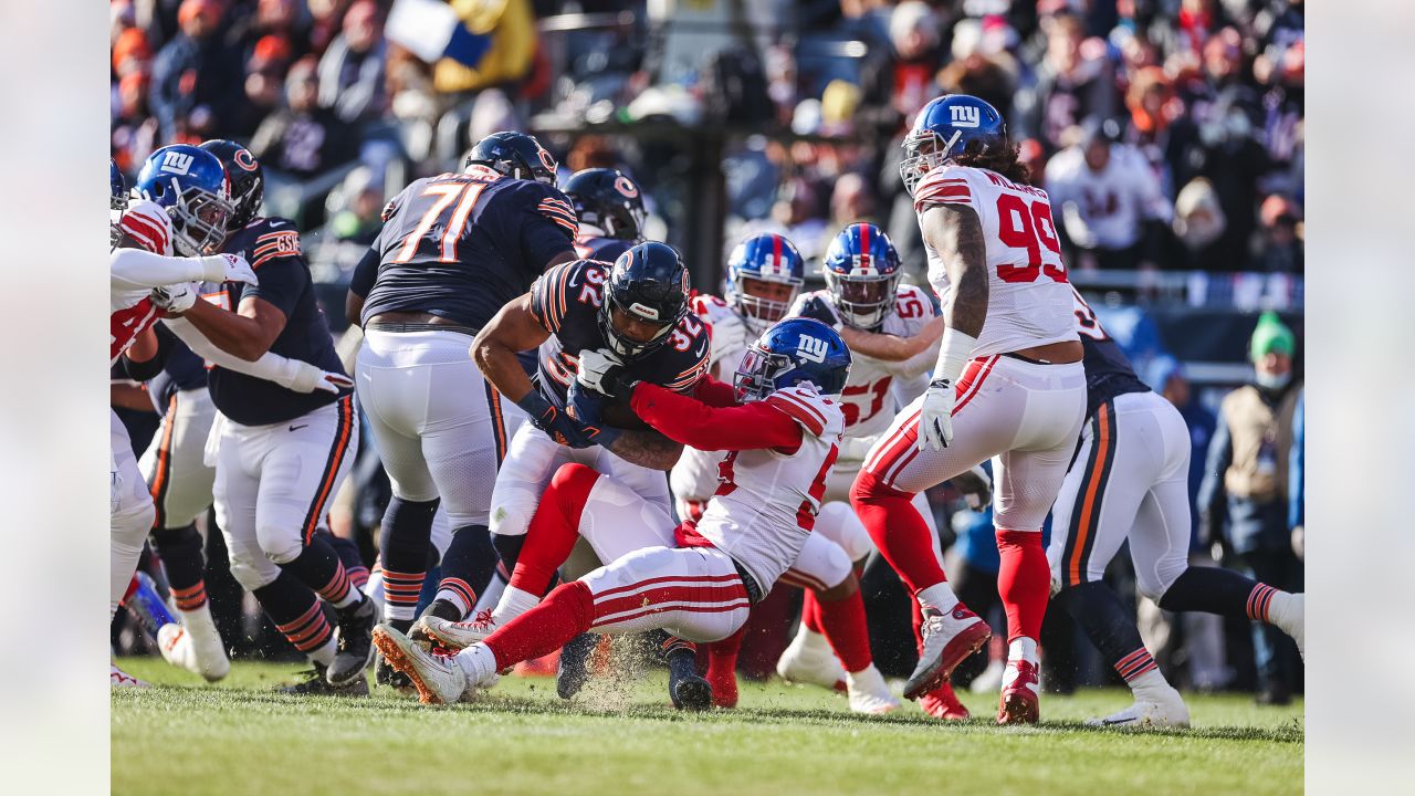 Chicago Bears linebacker Trevis Gipson (99) and safety Deon Bush