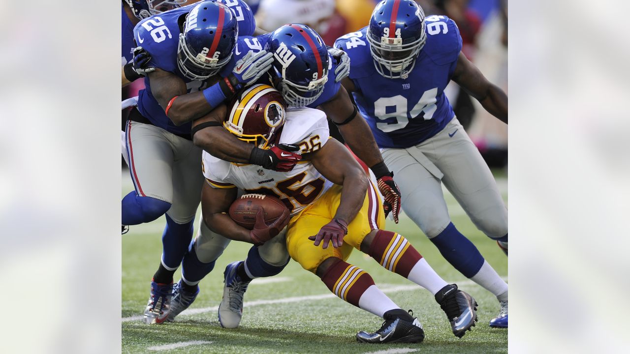 New York Giants defensive end Justin Tuck (91) celebrates his defense  causing a turnover during second half week 12 NFL action between the New  York Giants and Jacksonville Jaguars at New Meadowlands