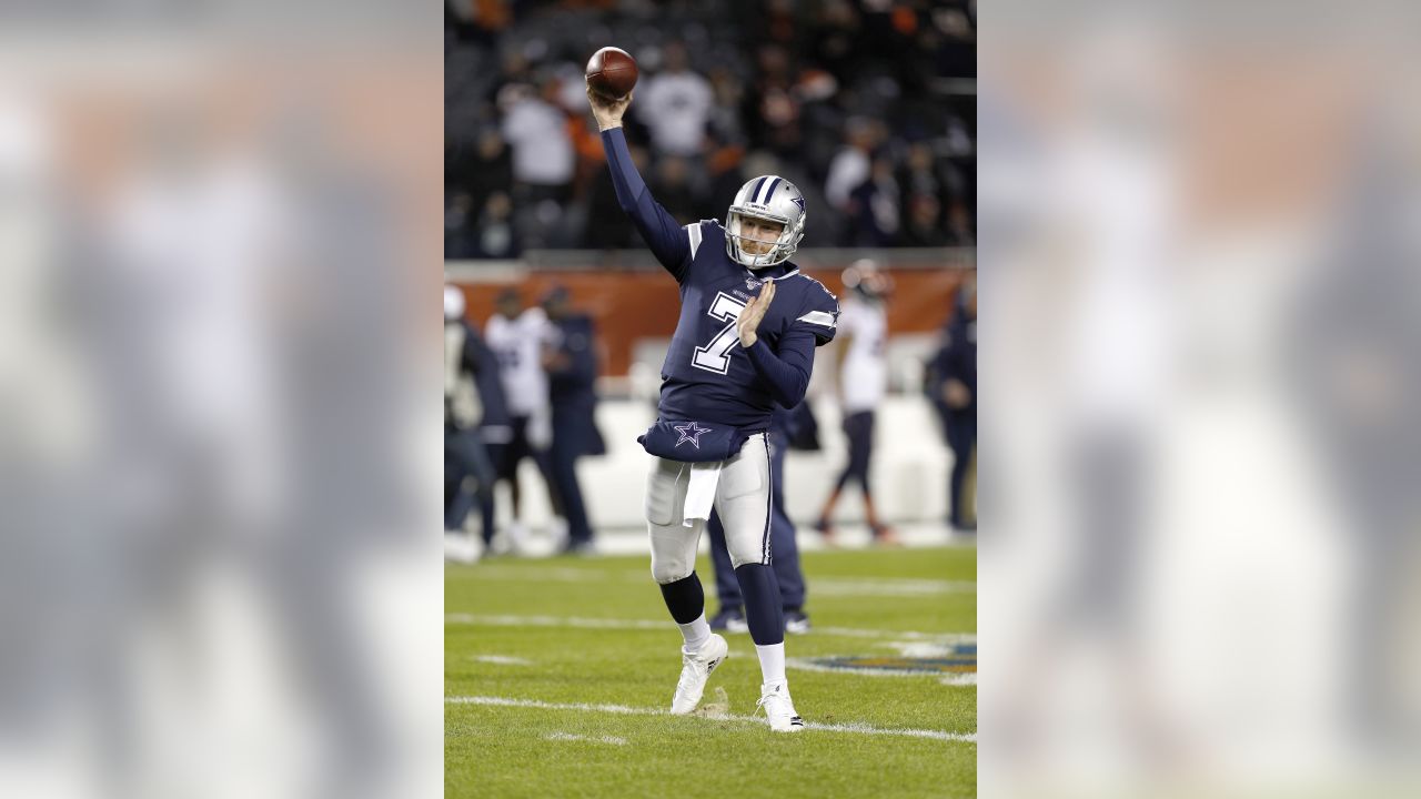 Dallas Cowboys quarterback Cooper Rush warms up before the game