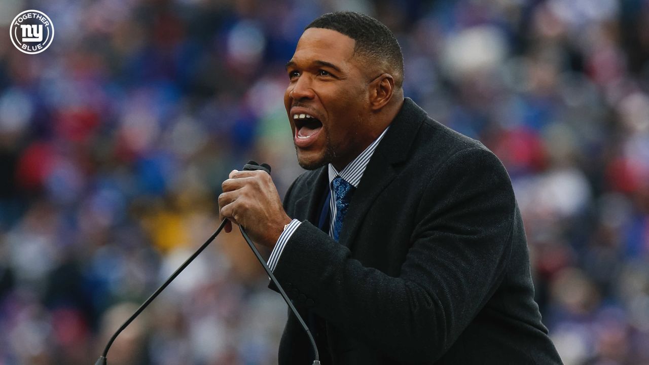 New York Giants Michael Strahan walks away from the podium after his  retirement press conference at Giants Stadium in East Rutherford, New Jersey  on June 6, 2008. Strahan retires after 15 years