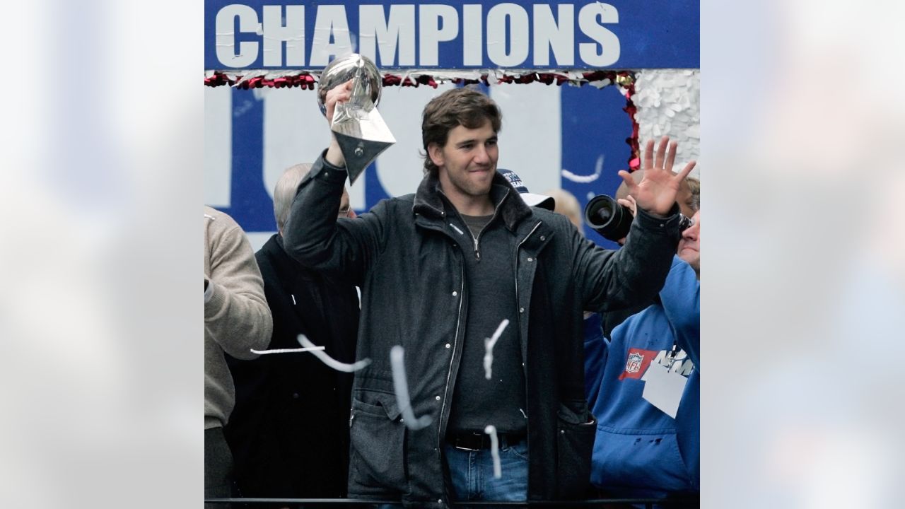 New York Giants Michael Strahan holds up the Vince Lombardi Trophy during  the Giants Super Bowl victory parade in New York City on February 5, 2008.  (UPI Photo/John Angelillo Stock Photo - Alamy