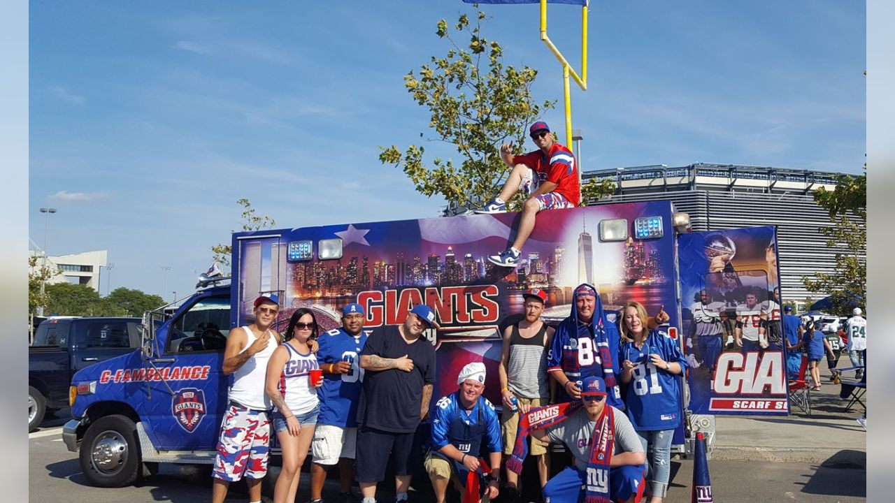 Fans tailgate before the Jets face the Giants in preseason game