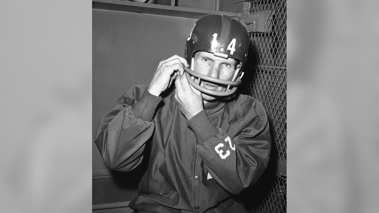 Y.A. Tittle, New York giant's quarter back, leaves the field with an  injured knee at palmer stadium in Princeton, N.C., August 29, 1964.Tittle  suffered the injury early in the second period of