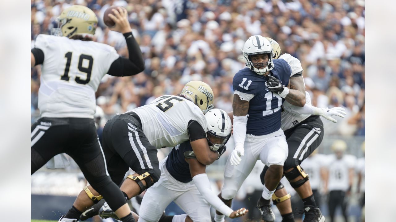 Penn State defensive end Shaka Toney (18) tackles Idaho quarterback Colton  Richardson (19) in the second quarter of an NCAA college football game  against Idaho in State College, Pa., on Saturday, Aug.