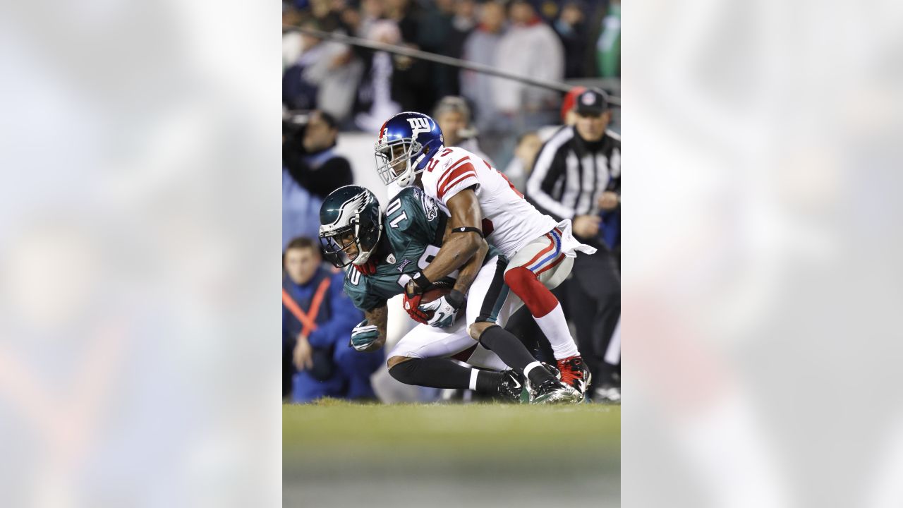 Oct 16, 2011; East Rutherford, NJ, USA; New York Giants cornerback Corey  Webster (23) intercepts a pass intended for Buffalo Bills wide receiver  Steve Johnson (not pictured) during the third quarter at