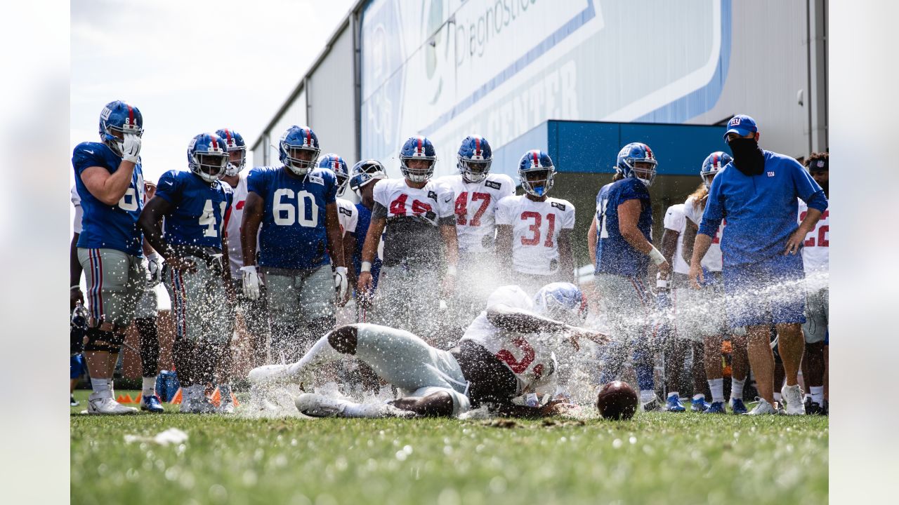 New York Giants video: Joe Judge takes part in muddy fumble drill