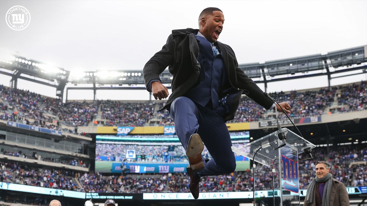 New York Giants defender Michael Strahan looks dejected while waiting on  the sidelines. The Detroit Lions defeated the New York Giants 28 to 13 at  Giants Stadium in East Rutherford, New Jersey