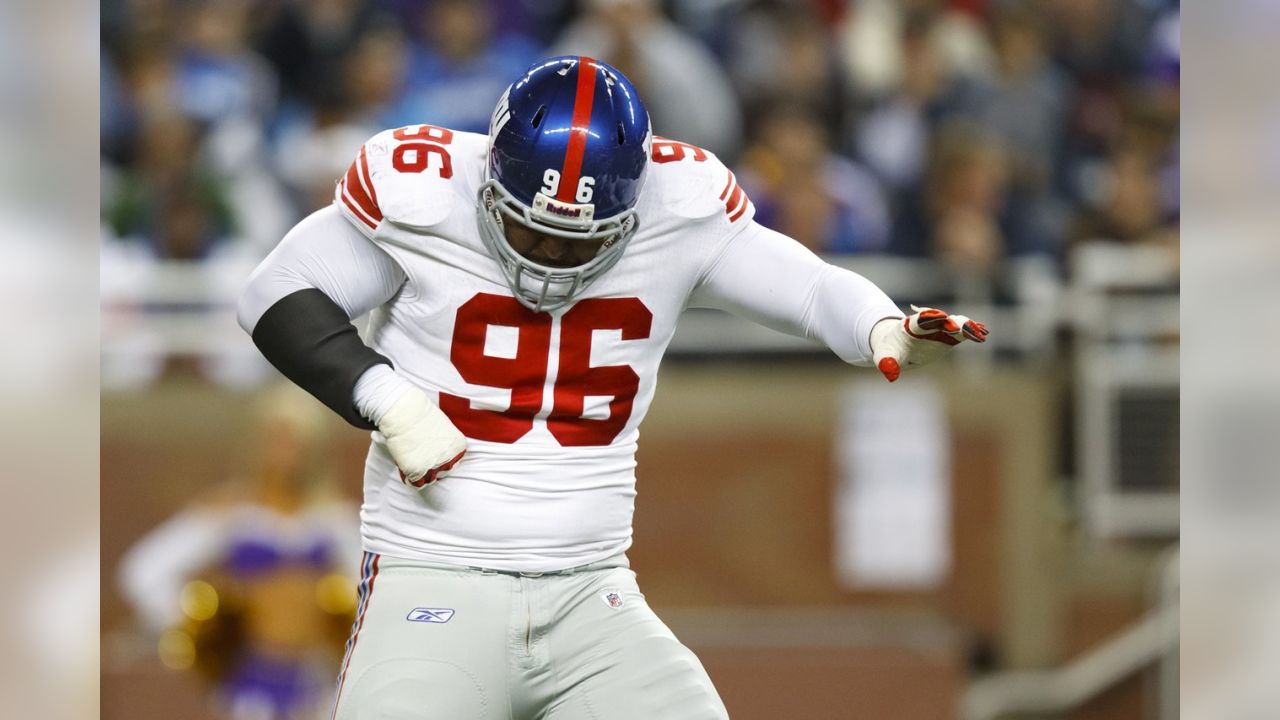 New York Giants defensive tackle Barry Cofield holds up a newspaper  proclaiming the Giants' win over the New England Patriots at Super Bowl  XLII at University of Phoenix Stadium in Glendale, Arizona