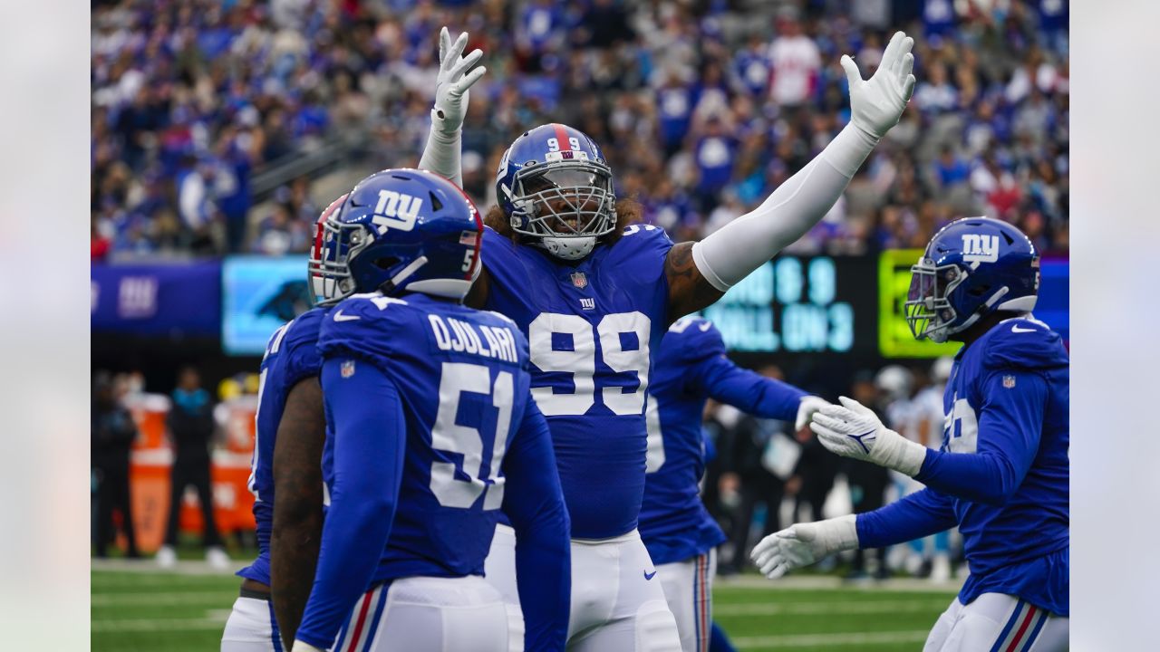 Carolina Panthers quarterback P.J. Walker (6) runs off the field against  the New York Giants during an NFL football game, Sunday, Oct. 24, 2021, in  East Rutherford, N.J. (AP Photo/Adam Hunger Stock