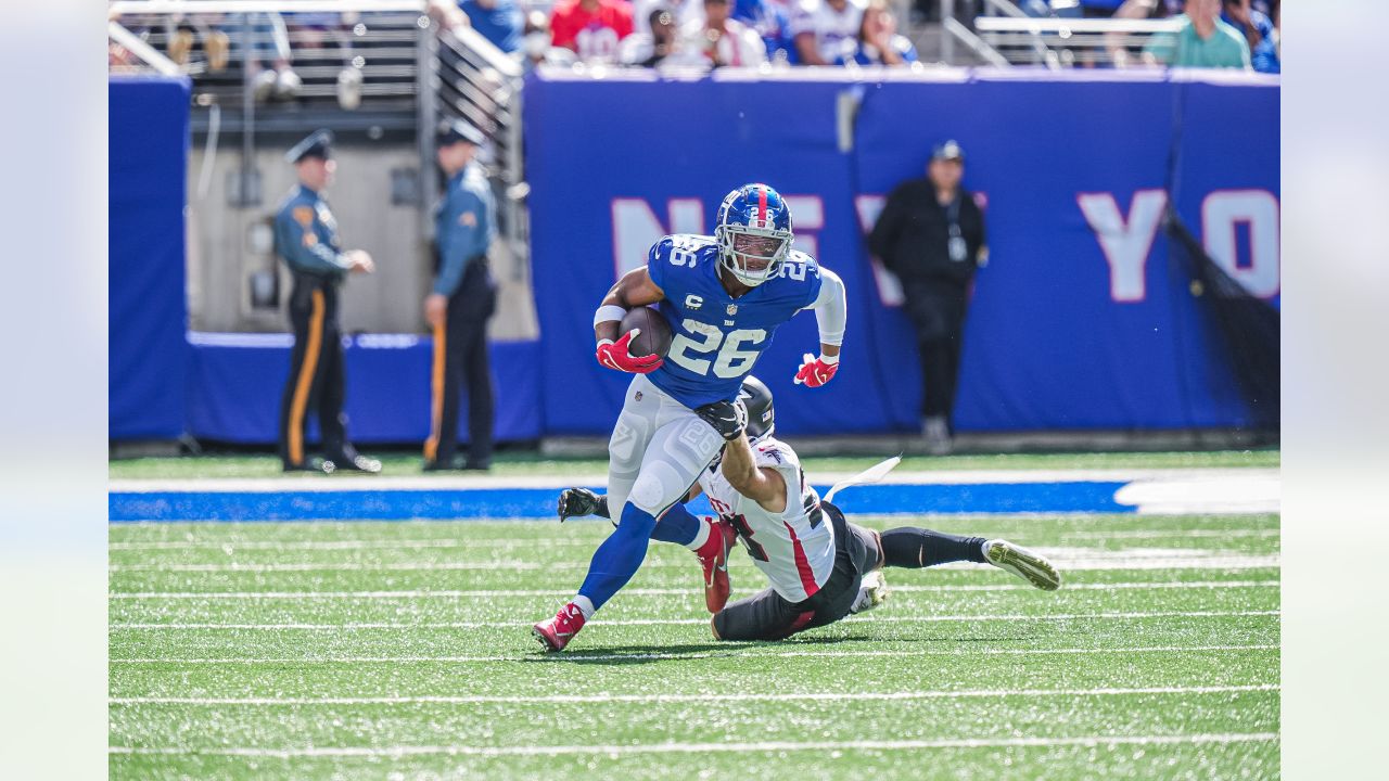 Atlanta Falcons running back Cordarrelle Patterson, below, is tackled by  New York Giants safety Xavier McKinney (29) during the first half of an NFL  football game, Sunday, Sept. 26, 2021, in East