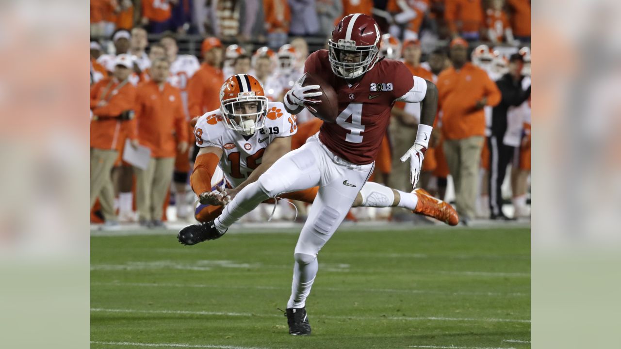 Alabama's Josh Jacobs (8) celebrates his touchdown run against Louisville  with teammates, including wide receiver Jerry Jeudy (4), during the second  half of an NCAA college football game Saturday, …