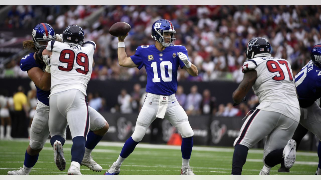 Houston Texans quarterback Deshaun Watson (4) breaks away from New York  Giants defensive end Kerry Wynn (72) during the first half of an NFL  football game Sunday, Sept. 23, 2018, in Houston. (