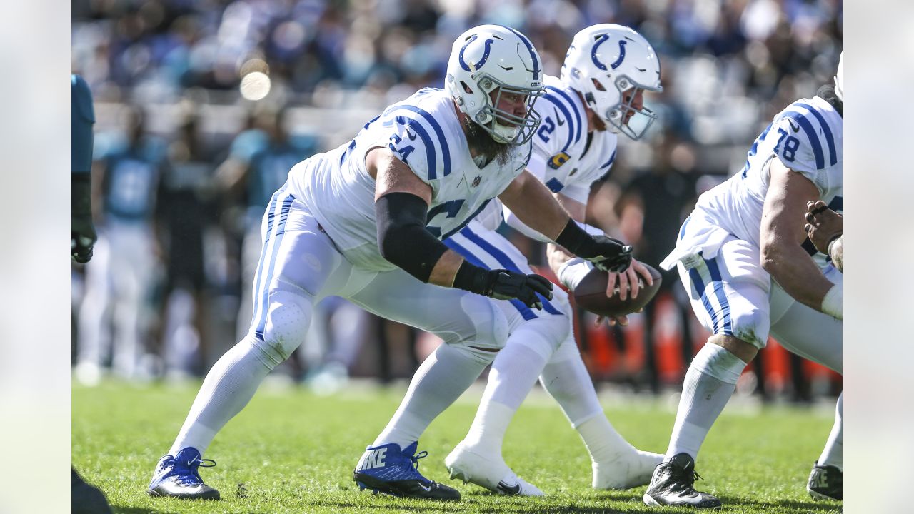 Indianapolis Colts guard Mark Glowinski (64) walks back to the