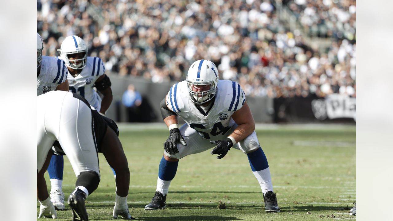 Indianapolis Colts guard Mark Glowinski (64) walks back to the