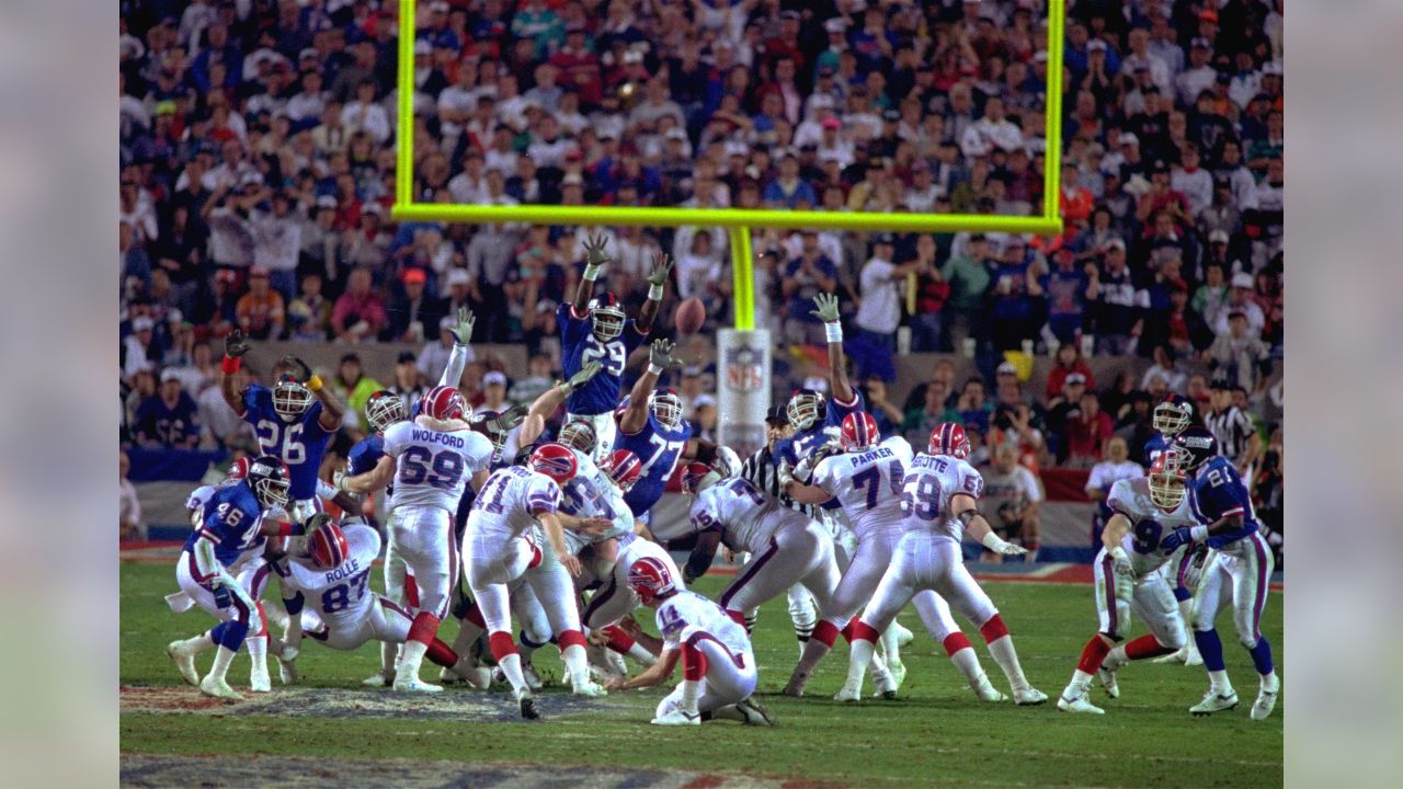 Defensive End Leon Seals of the Buffalo Bills and Quarterback Jeff News  Photo - Getty Images