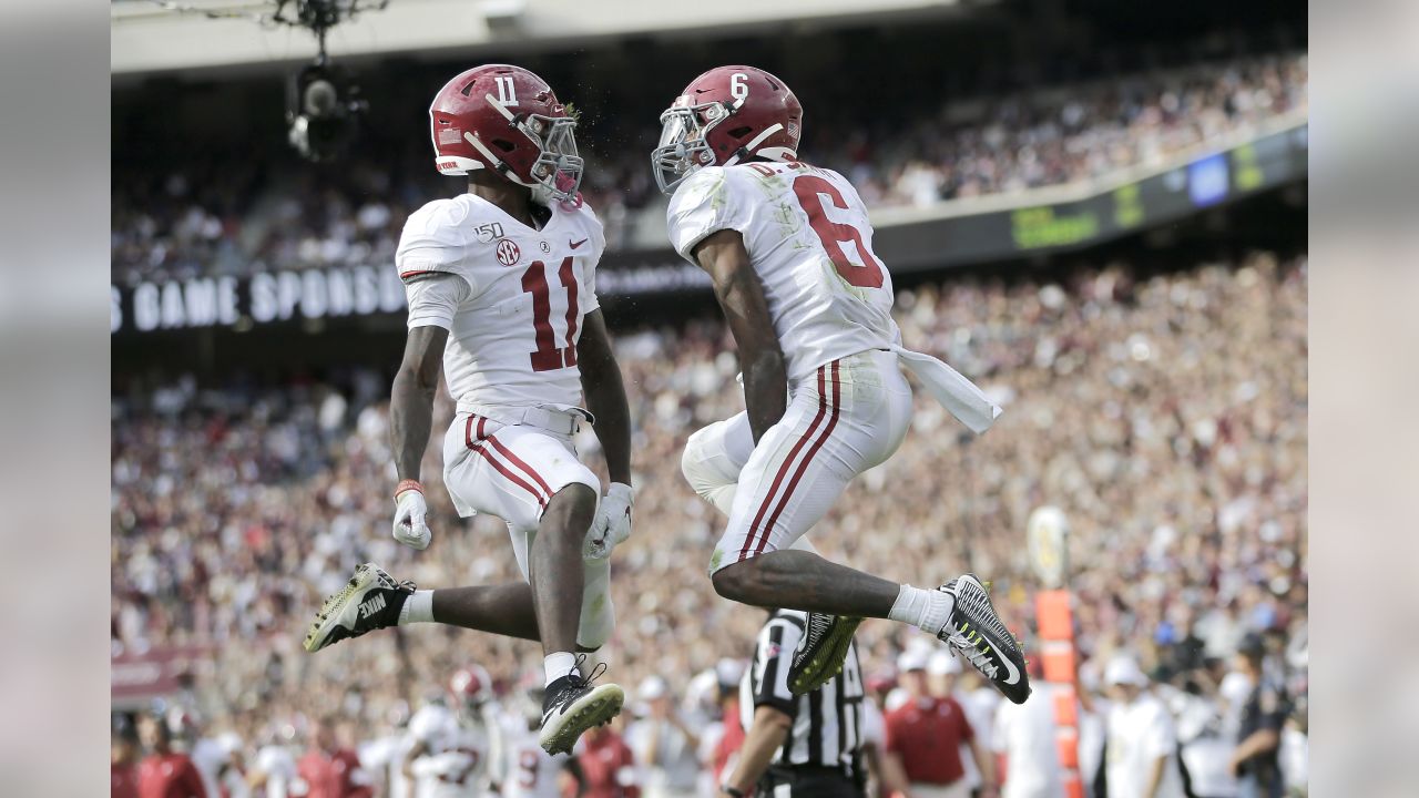 Henry Ruggs III Alabama Crimson Tide Unsigned Crimson Jersey Action Photo  vs. FSU Photograph