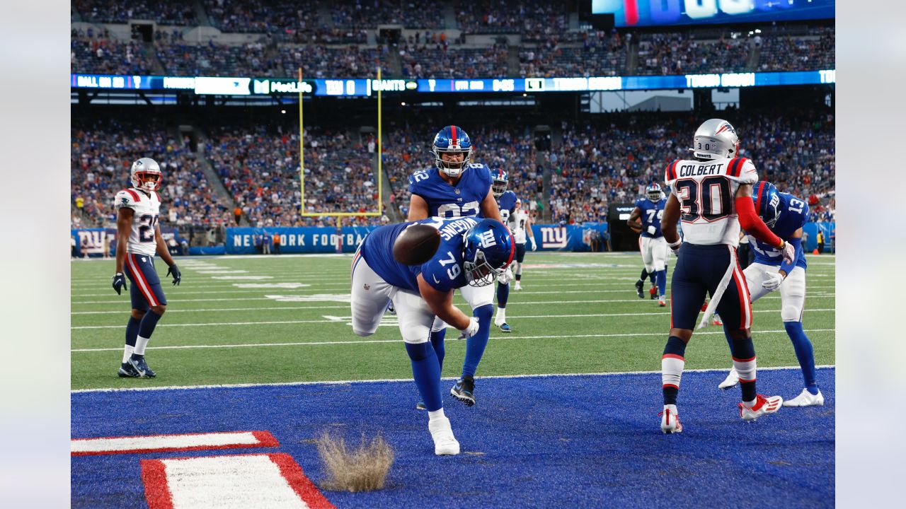 New York Giants running back Sandro Platzgummer (34) warms up during an NFL  preseason football game against the New England Patriots, Sunday, Aug. 29,  2021, in East Rutherford, N.J. (AP Photo/Adam Hunger