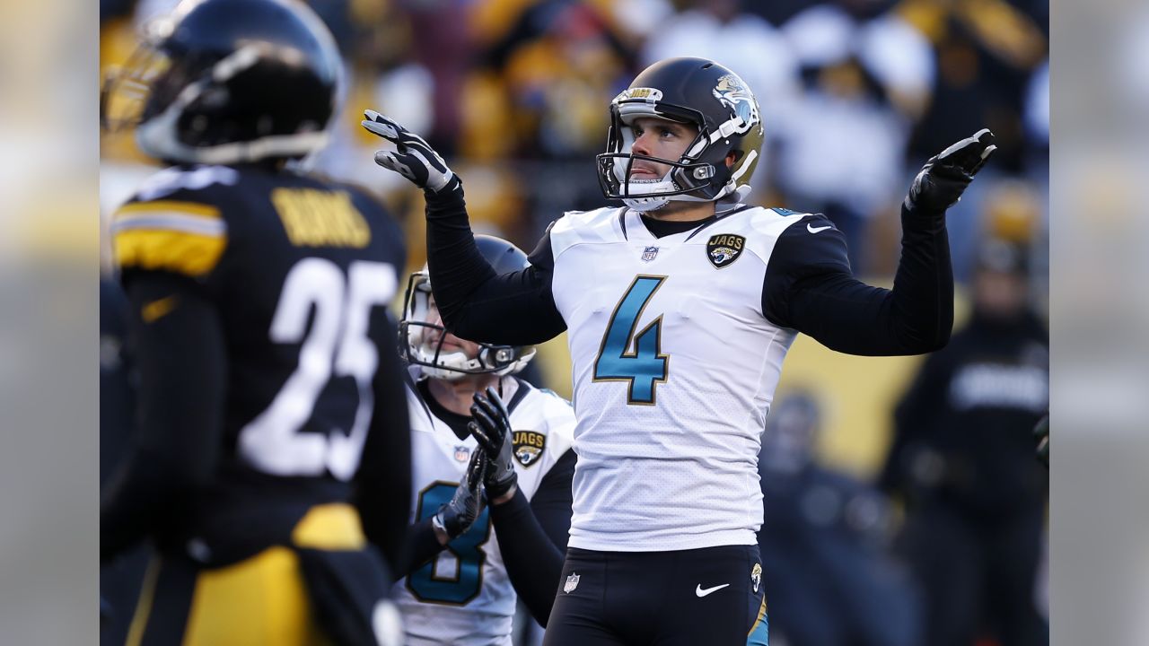 Jacksonville Jaguars kicker Josh Lambo (4) celebrates with Calais Campbell  (93) after kicking a field goal during the second half of an NFL divisional  football AFC playoff game against the Pittsbu …