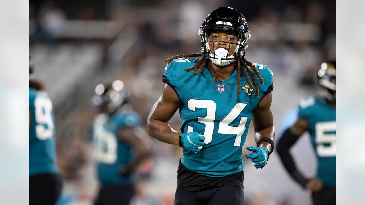 JACKSONVILLE, FL - JANUARY 14: Jacksonville Jaguars cornerback Tre Herndon  (37) runs with the ball during the game between the Los Angeles Chargers  and the Jacksonville Jaguars on January 14, 2023 at