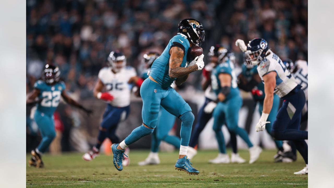 The Sword of Honor is moved to the field before the first half of an NFL  football game between the Tennessee Titans and the Jacksonville Jaguars,  Thursday, Dec. 6, 2018, in Nashville