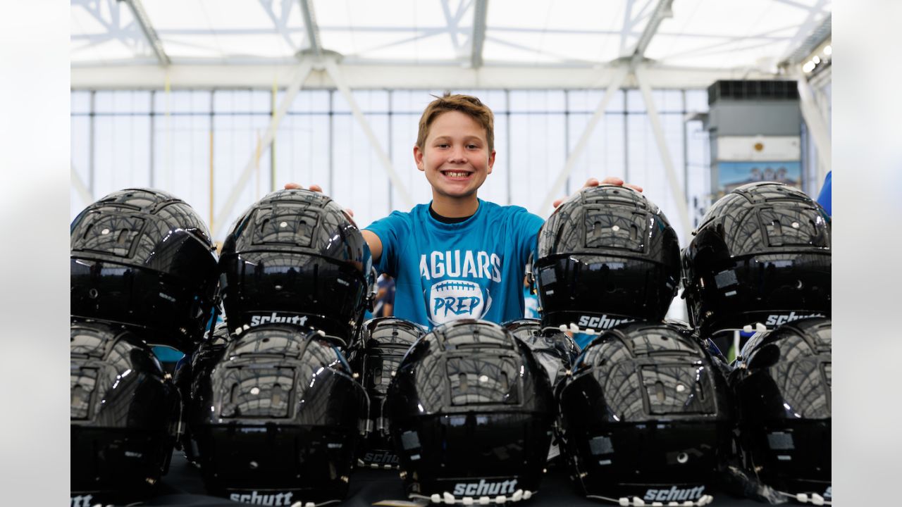 Jaguars Donate Helmets To Local Youth Football Teams