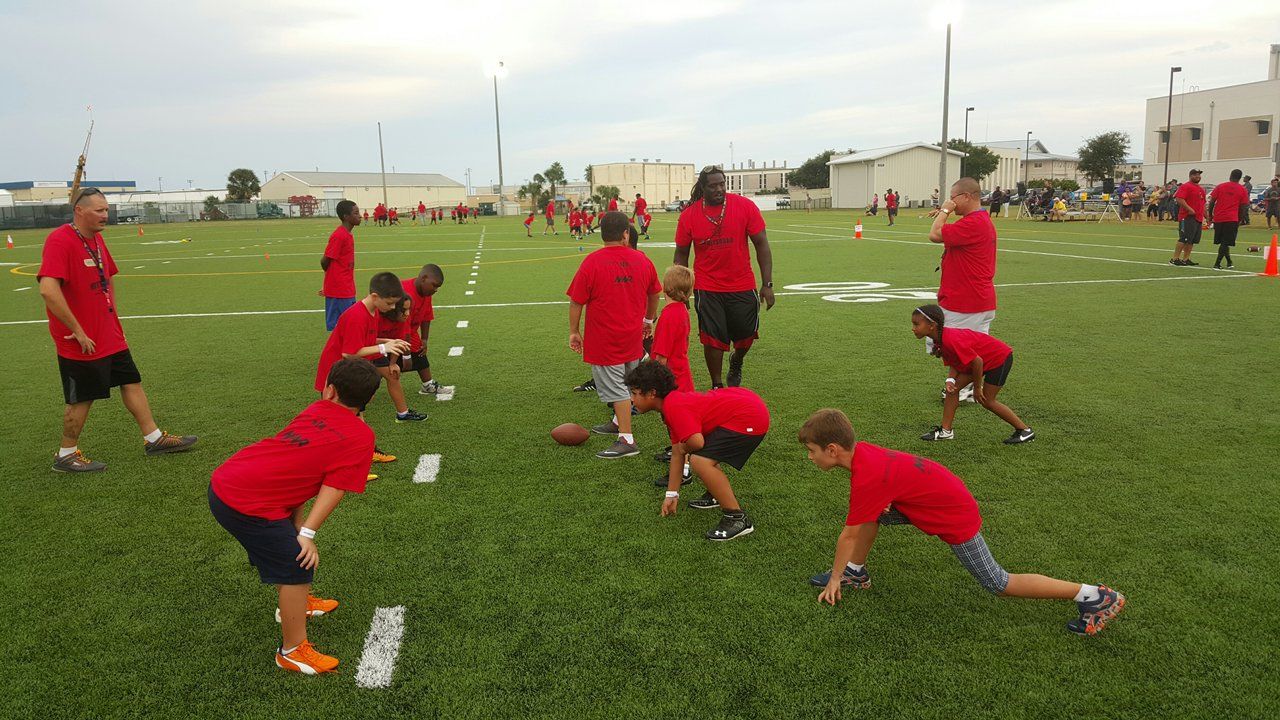 NFL player hosts military youth football camp