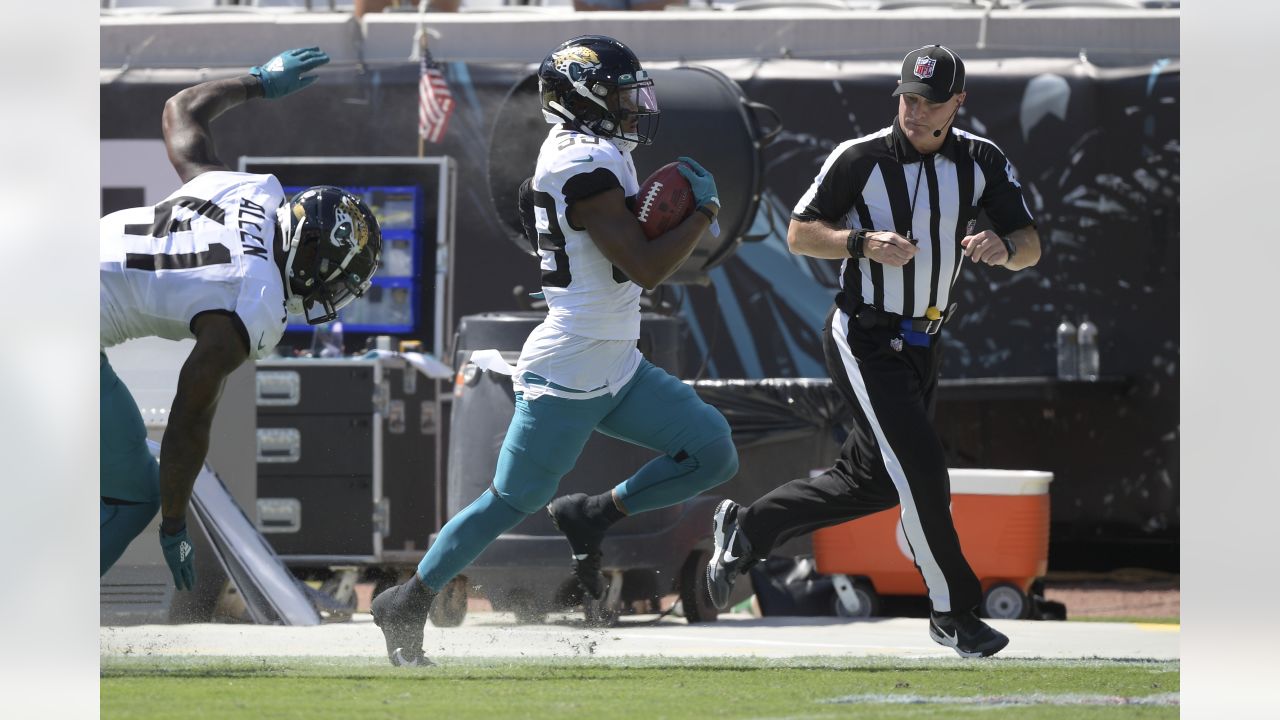 Jacksonville, Florida, USA. January 7, 2023: Jacksonville Jaguars wide  receiver JAMAL AGNEW (39) gets tackled after returning the ball during the  Jacksonville Jaguars vs Tennessee Titans NFL game at TIAA Bank Field