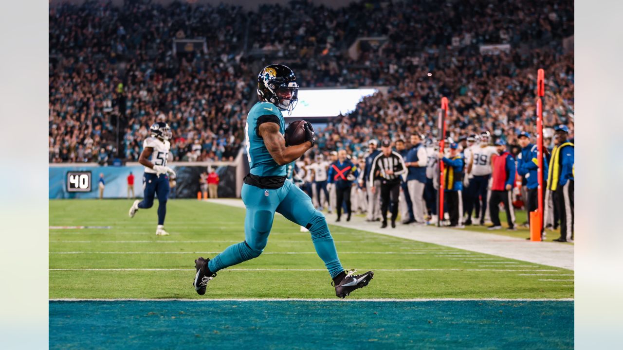 The Sword of Honor is moved to the field before the first half of an NFL  football game between the Tennessee Titans and the Jacksonville Jaguars,  Thursday, Dec. 6, 2018, in Nashville