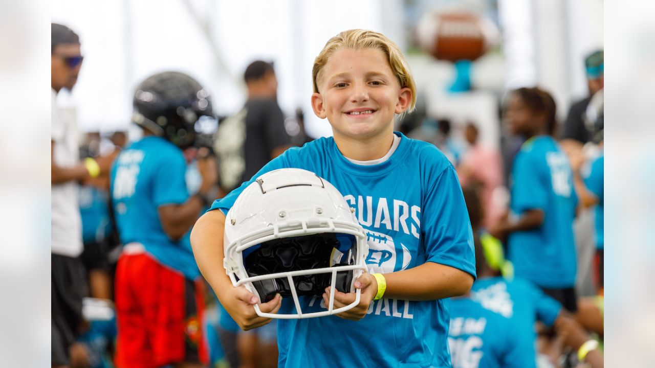 Jaguars Donate Helmets To Local Youth Football Teams