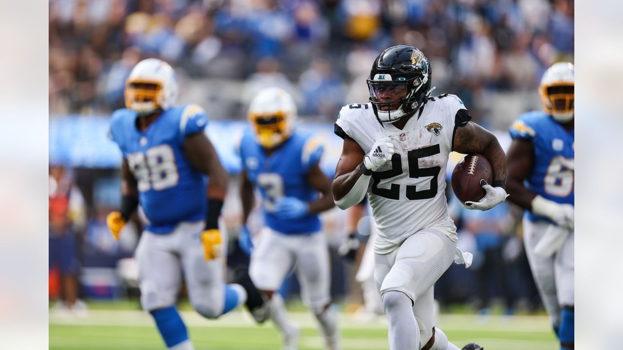 The Jacksonville Jaguars defense, left, sets up against the Los Angeles  Chargers offense at the line of scrimmage during the second half of an NFL  football game Sunday, Dec. 8, 2019, in