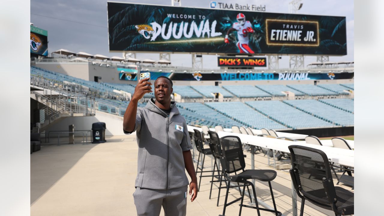 Travis Etienne Jr. #1 of the Jacksonville Jaguars smiles on the News  Photo - Getty Images