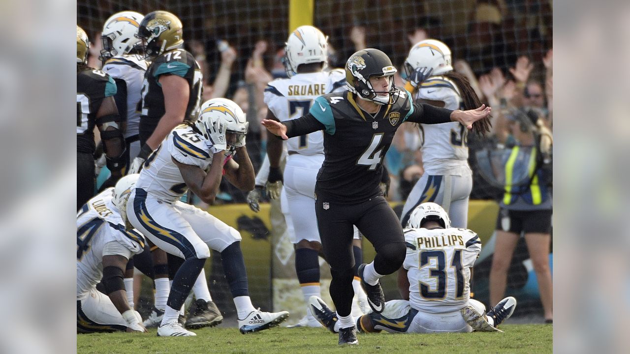 Jacksonville Jaguars kicker Josh Lambo (4) celebrates his field goal that  insures the 45-32 win against the Pittsburgh Steelers at the AFC Divisional  round playoff game at Heinz Field in Pittsburgh on