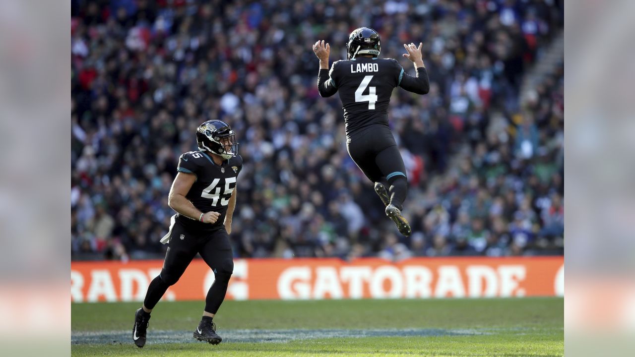 Jacksonville Jaguars kicker Josh Lambo (4) celebrates with Calais Campbell  (93) after kicking a field goal during the second half of an NFL divisional  football AFC playoff game against the Pittsbu …