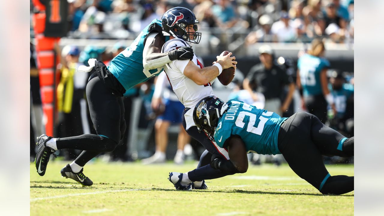 Jacksonville Jaguars vs. Houston Texans. Fans support on NFL Game.  Silhouette of supporters, big screen with two rivals in background Stock  Photo - Alamy