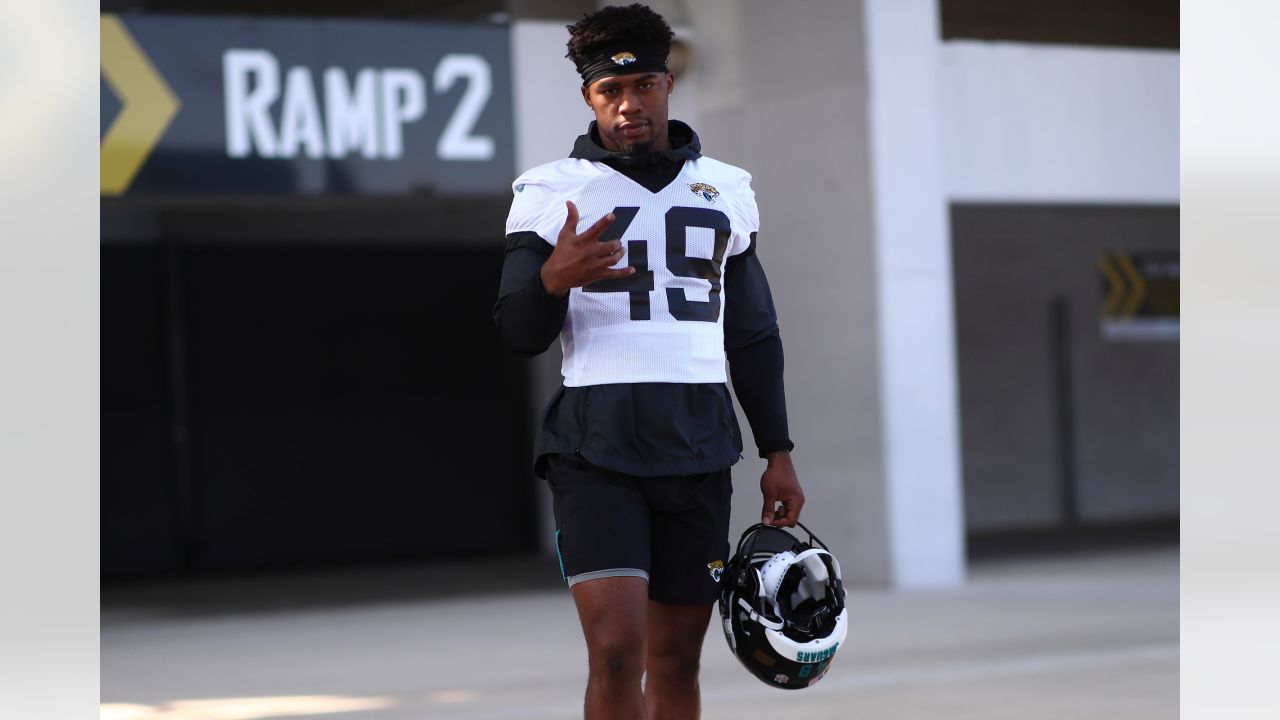 Jacksonville Jaguars linebacker Chapelle Russell (49) runs during