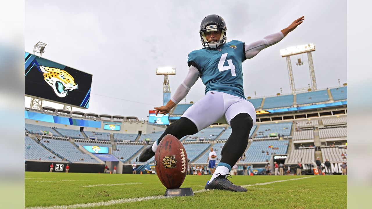 Jacksonville Jaguars kicker Josh Lambo, right, kicks a field goal in the  first half of an NFL football game against the Cincinnati Bengals, Sunday,  Oct. 20, 2019, in Cincinnati. (AP Photo/Frank Victores