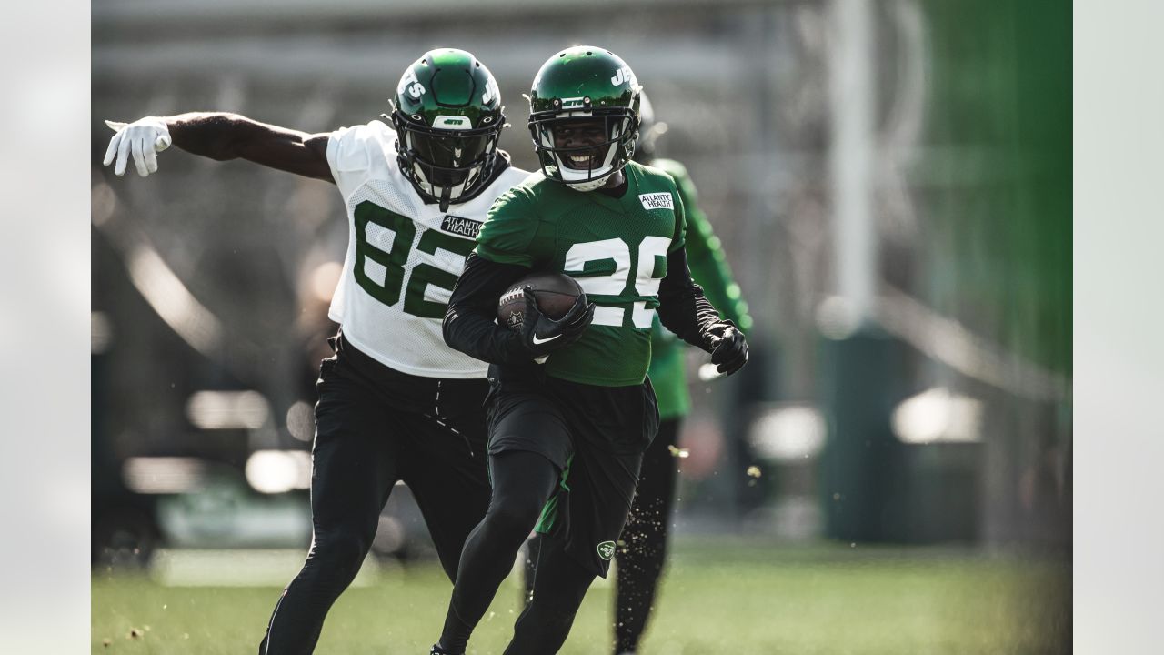 New York Jets guard Nate Herbig (71) walks off the field after an