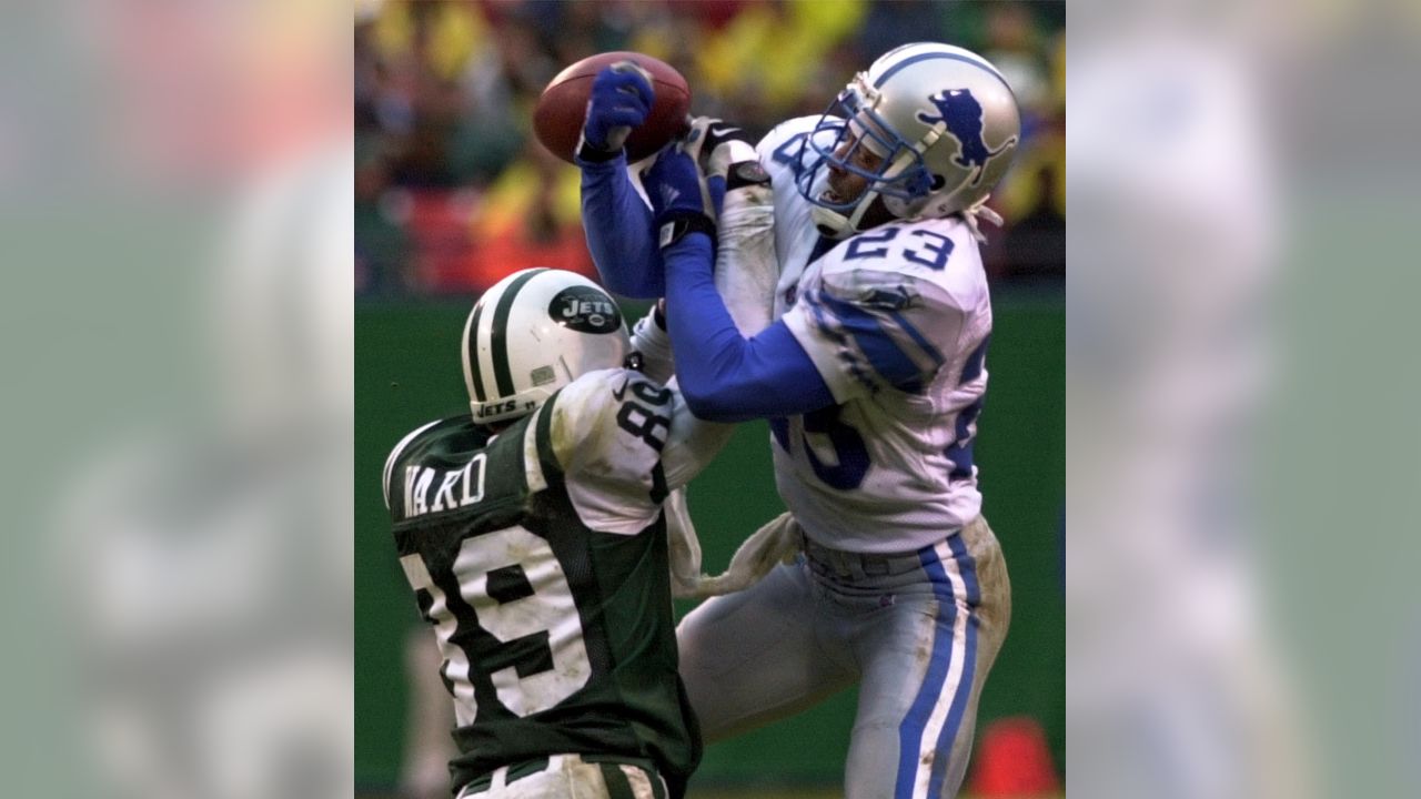 Cincinnati Bengals wide receiver Chad Johnson (85) gets tackled by Detroit  Lions cornerback Dre' Bly (32) in the first quarter December 18, 2005 at  Ford Field in Detroit. The Bengals defeated the