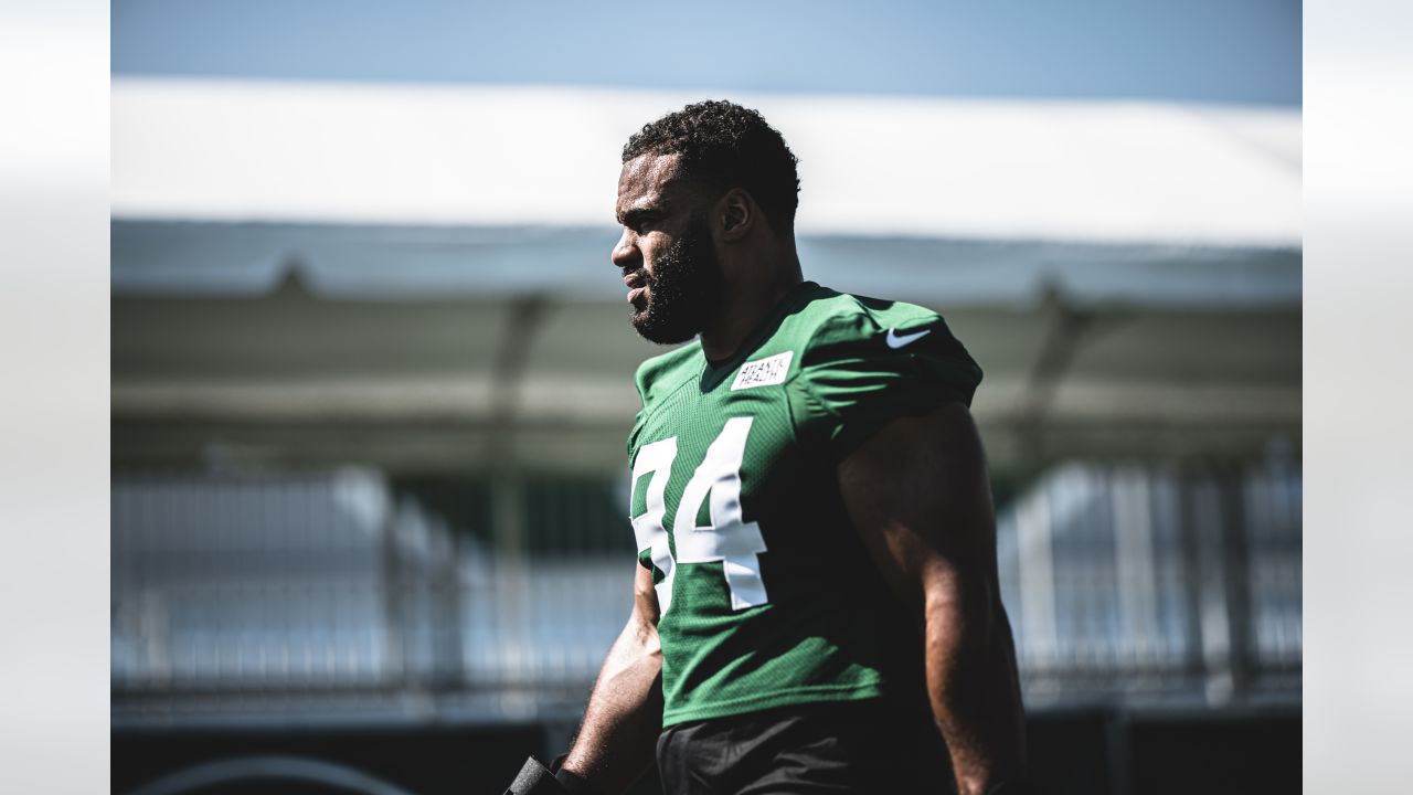 C.J. Uzomah arrives at Jets camp in interesting Zach Wilson T-shirt