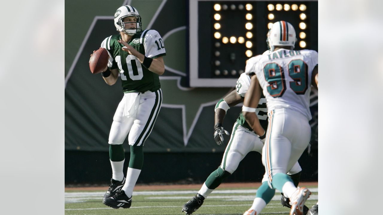 Miami Dolphins Chad Pennington (10) prepares to throw a pass in