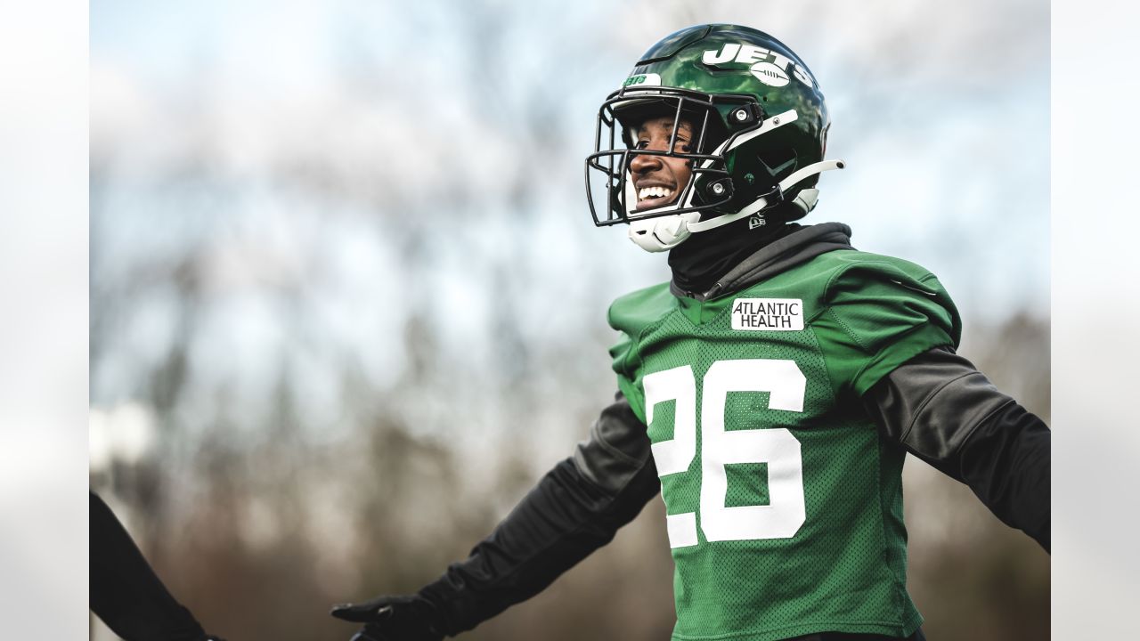 EAST RUTHERFORD, NJ - NOVEMBER 06: New York Jets running back James Robinson  (23) celebrates with teammate New York Jets running back Michael Carter  (32) scores a touchdown during the third quarter