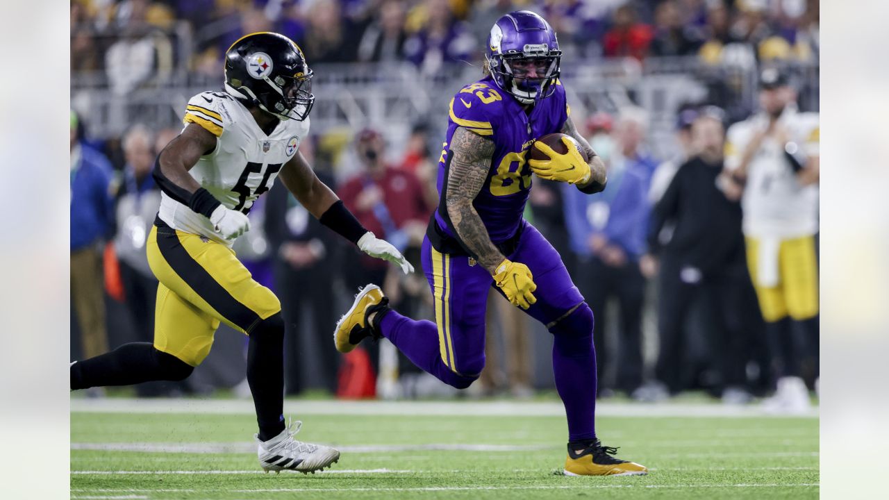 Cincinnati Bengals linebacker Germaine Pratt (57) tackles Minnesota Vikings  tight end Tyler Conklin (83) after he made catch in the first half of an  NFL football game, Sunday, Sept. 12, 2021, in