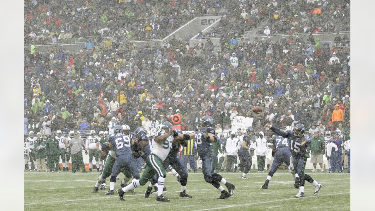 New York Jets' safety Abram Elam tackles Seattle Seahawks wide receiver  Courtney Taylor after catching a Seneca Wallace pass for a seven yard gain  in the third quarter at Qwest Field in