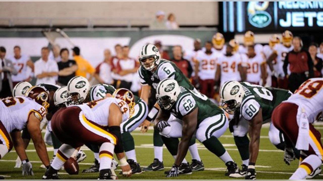 New York Jets quarterback Mark Brunell walks off of the field in the fourth  quarter in week 1 of the NFL Preseason at The New Meadowlands Stadium in  East Rutherford, New Jersey