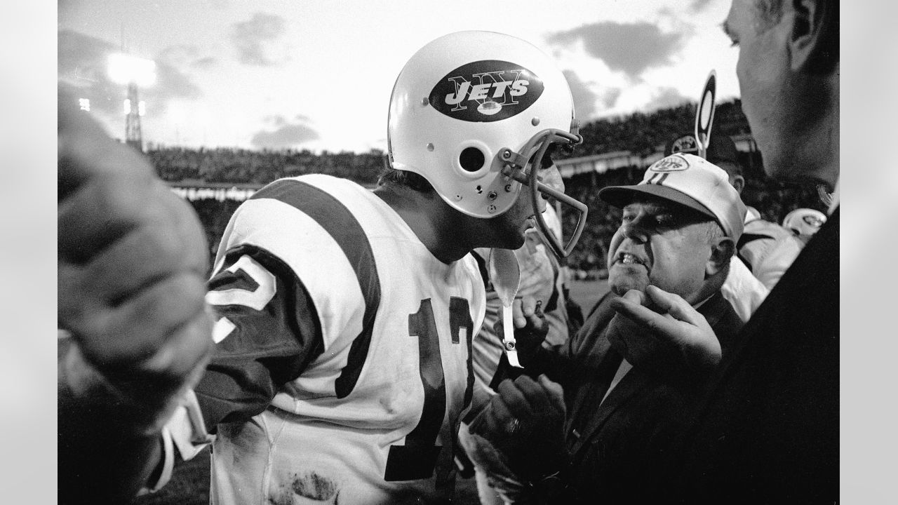 New York Jets quarterback Joe Namath, (12), gets the pass off down field  before Baltimore Colts defensive lineman Bubba Smith (78) could get his  hands on Namath during Super Bowl III in