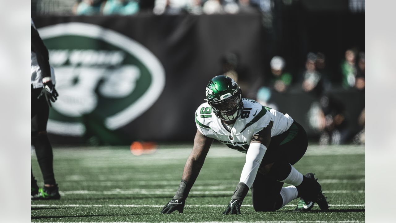 John Franklin-Myers of the New York Jets looks on during warmups