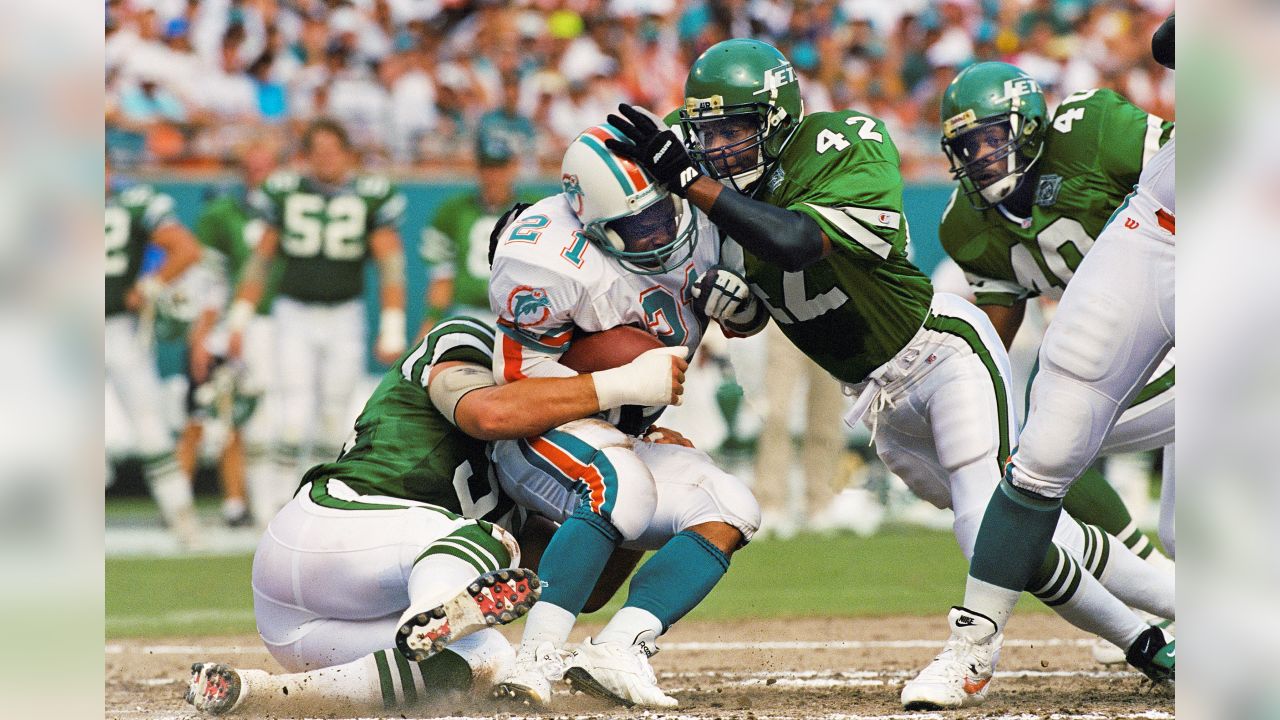 FILE - New York Jets Ronnie Lott (42) and Jeff Lageman, left