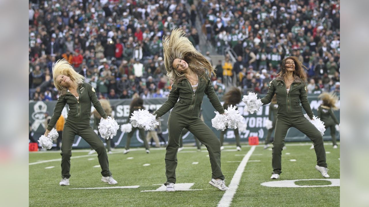 New York Jets Cheerleaders perform during half time at the 8th Annual  DirecTV Beach Bowl Celebrities vs. NFL Greats at Pier 40 in New York, NY,  on February 1, 2014(Photo by Anthony