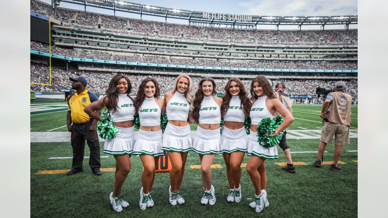 The Jets Flight Crew cheerleaders pump up fans for Monday night's game