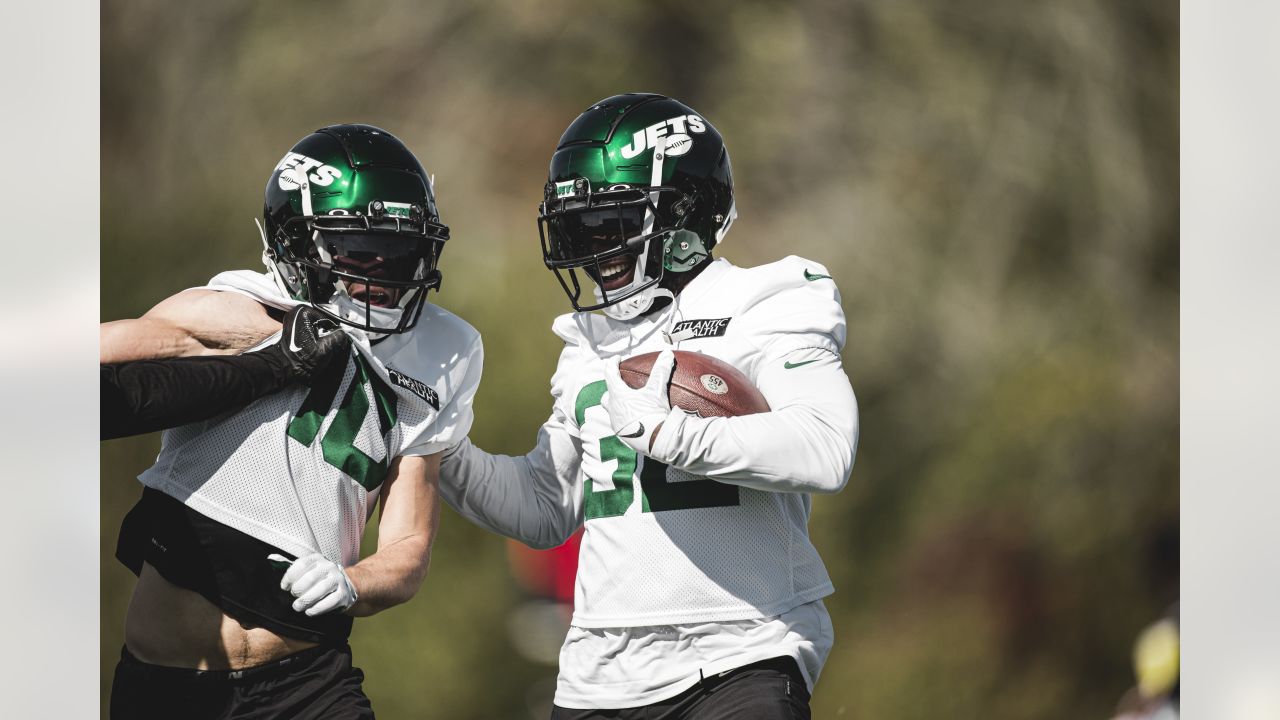 New York Jets guard Nate Herbig (65) walks to the line of